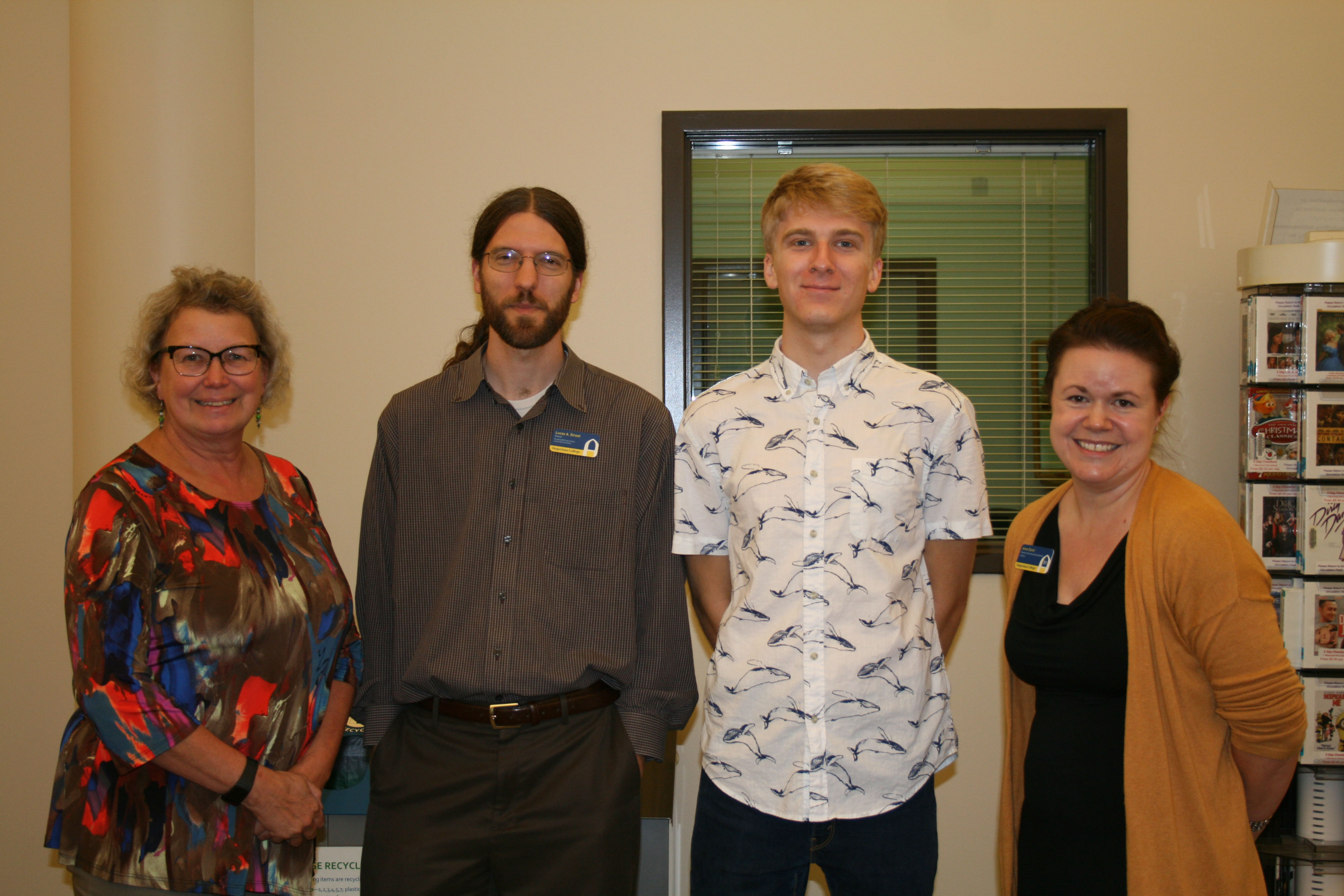Photo of the 2017 winner, Jack Harris, and the judges.