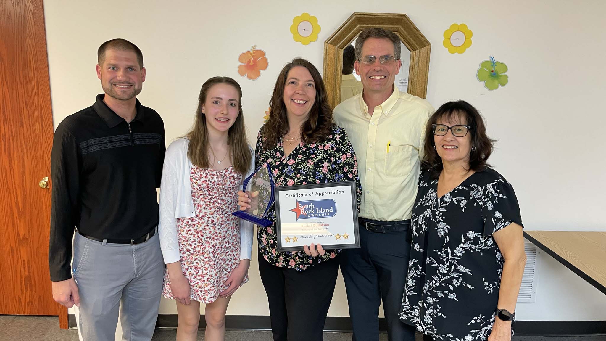 Rachel Gustafson with family and township representatives