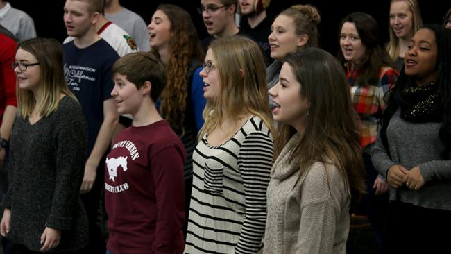 Students singing in a choir