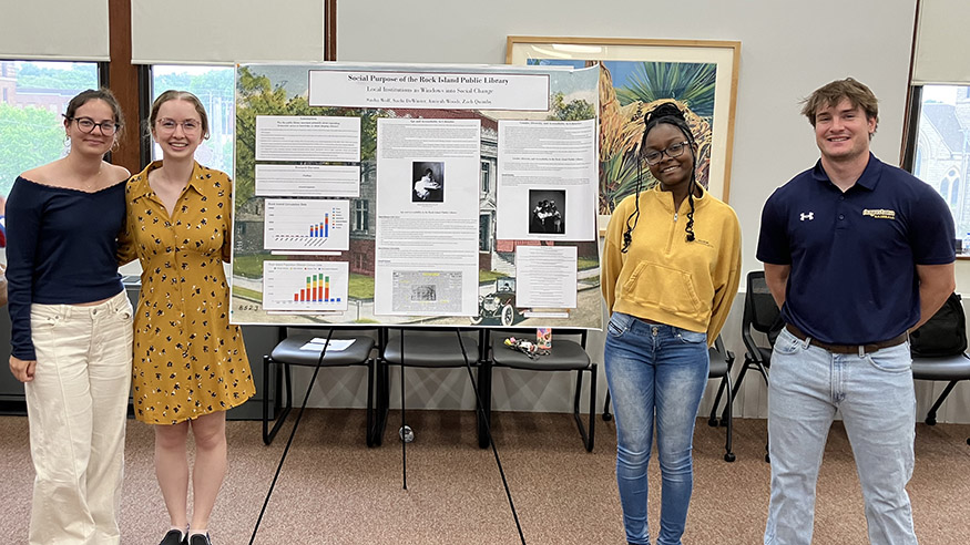 Students with poster