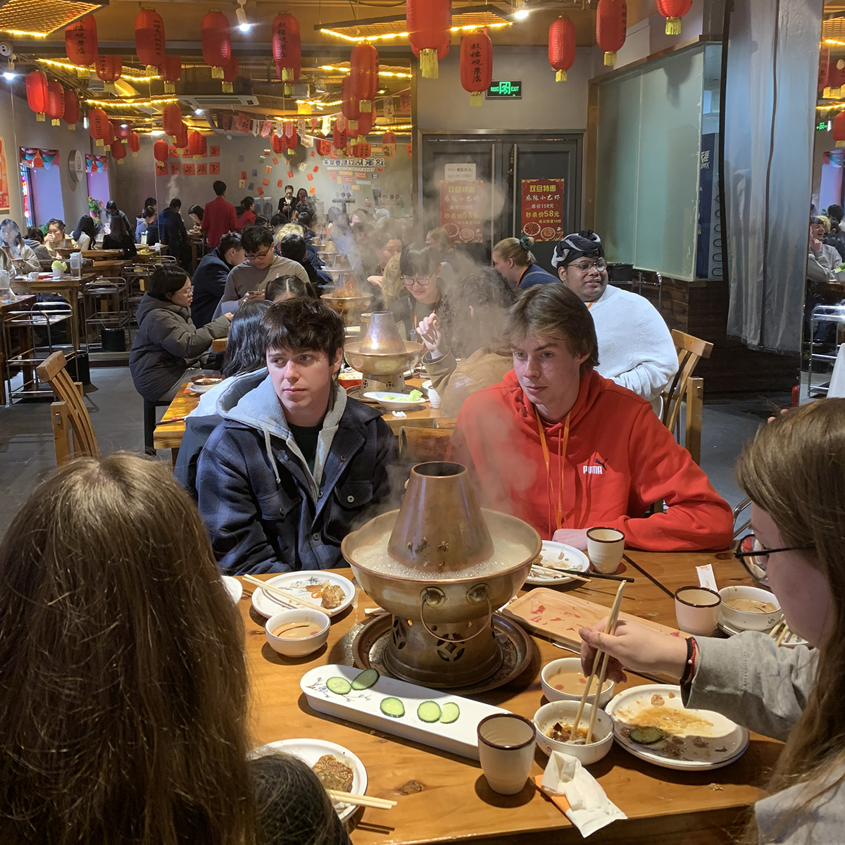 A group of students trying hotpot