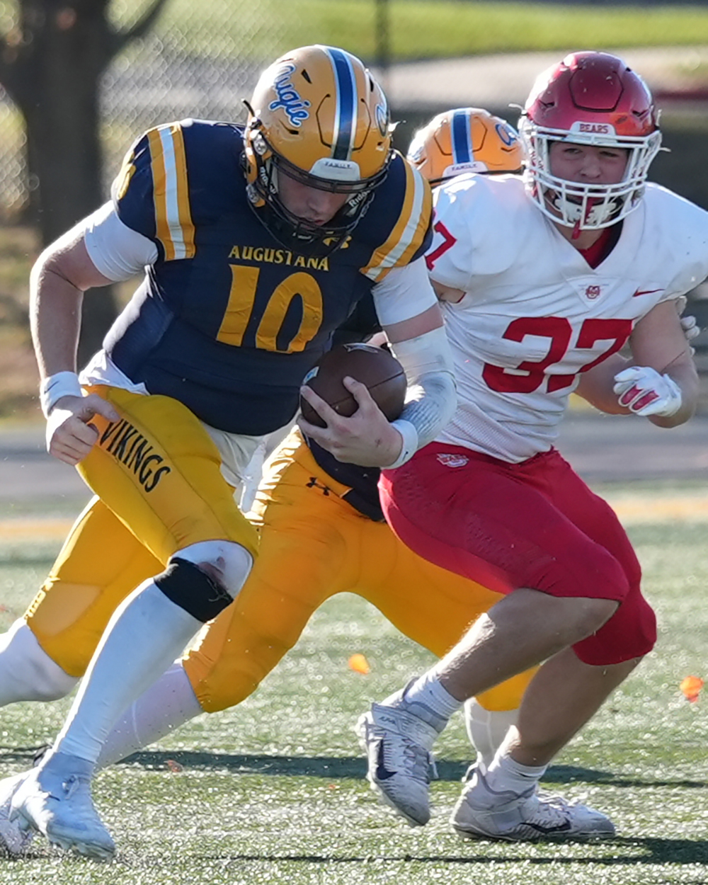 Three college football players in action