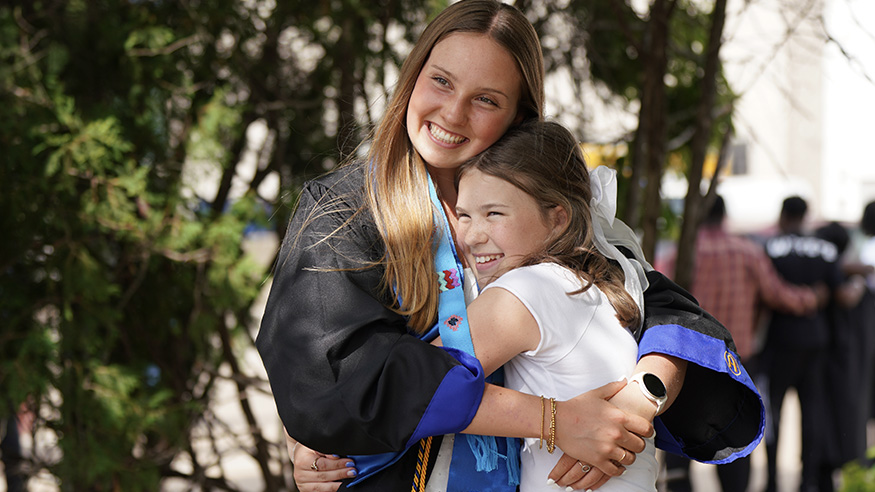 Grad with sister