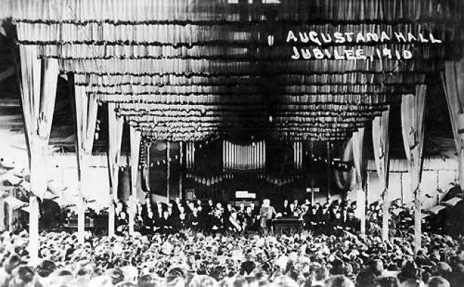 A 1910 post card depicts the Augustana Jubilee in the hall especially built for it.