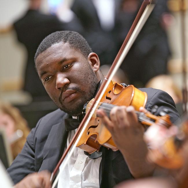 Augustana student in the orchestra