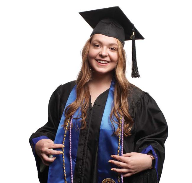 Anna Triska ’22 in graduation robe and cap