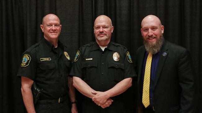Chief of Police Tom Phillis, Officer Ryan Tone and Dean Wes Brooks