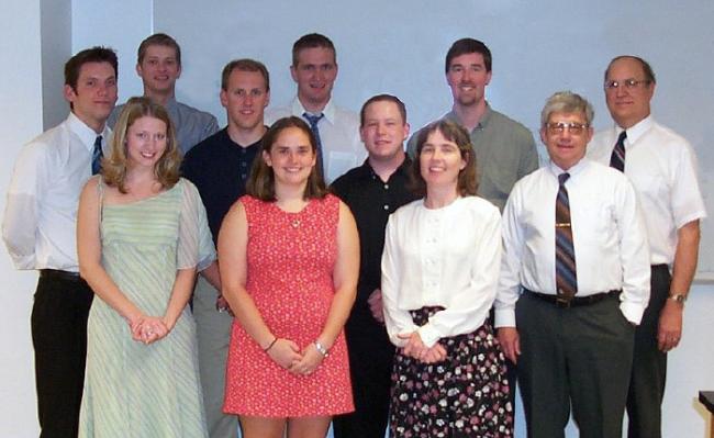 Cecilia Vogel with students, faculty