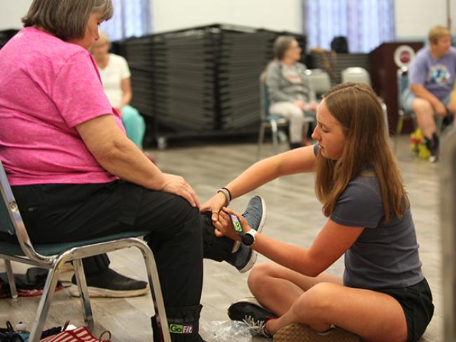 Putting on ankle weights