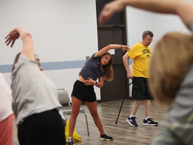 Stretching during exercise class