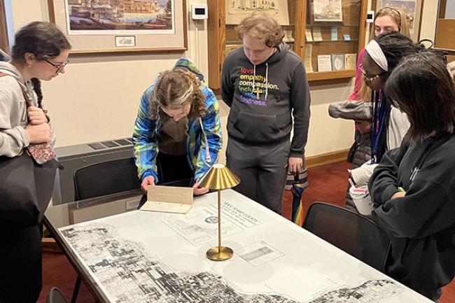 Students studying archives