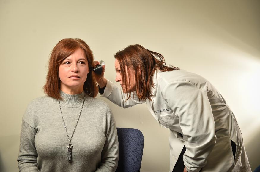 Dr. Ann Perreau and a patient 