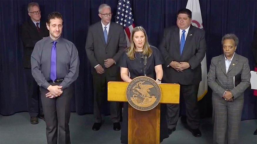 Emily Landon at Gov. Pritzker news conference