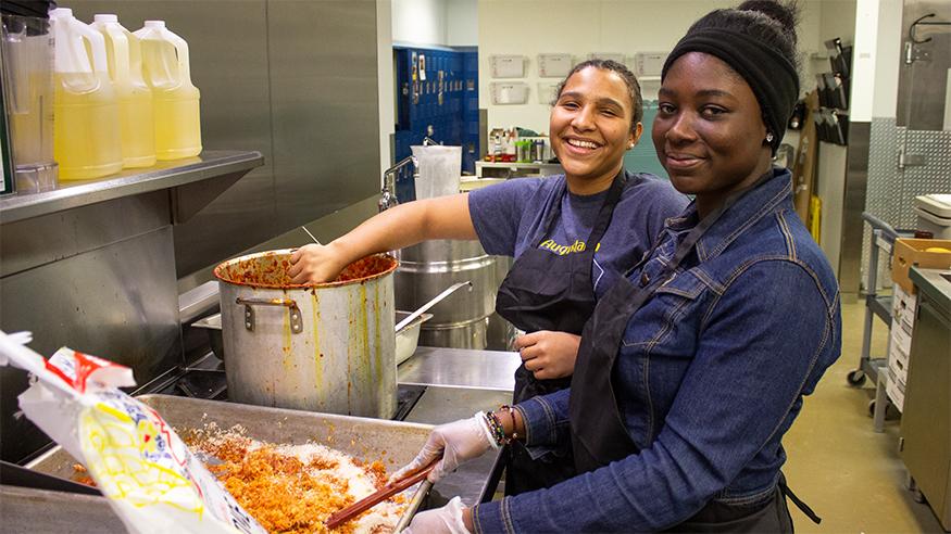 Nadia Ayensah and Caroline Siaw in the kitchen